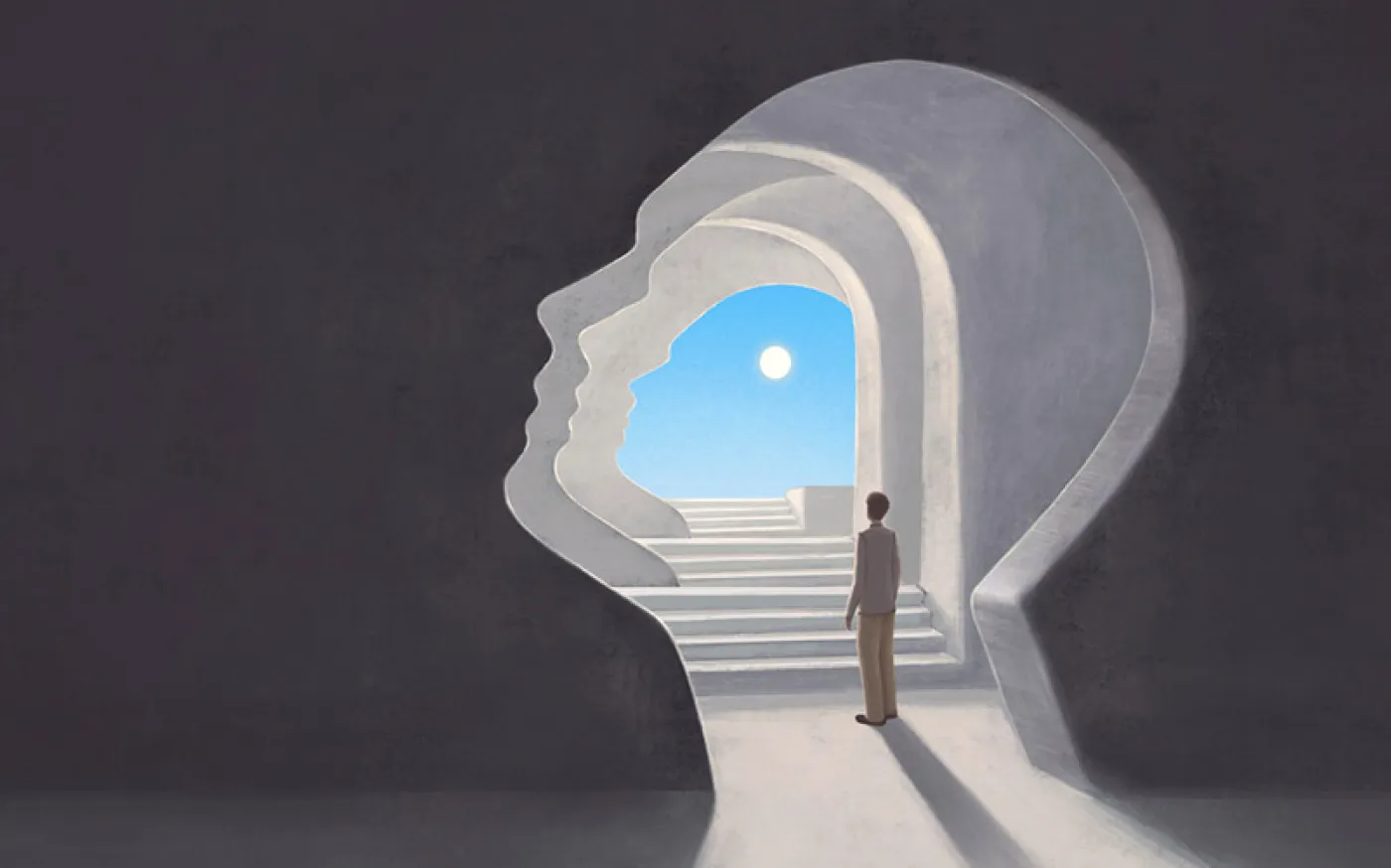 A person stands in a tunnel shaped like a human head, looking toward a bright sky and sun at the end of a staircase, symbolizing self-discovery or inner journey.